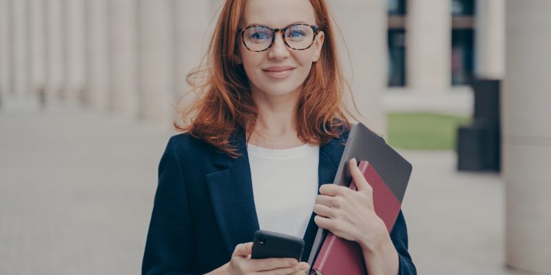 confident-beautiful-red-haired-female-business-consultant-holding-modern-smartphone-and-laptop.jpg confident-beautiful-red-haired-female-business-consultant-holding-modern-smartphone-and-laptop.jpg