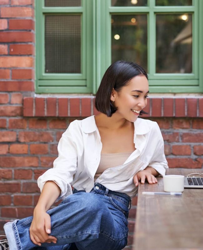 portrait-of-young-stylish-woman-influencer-sitting-in-cafe-with-cup-of-coffee-and-laptop-smiling.jpg portrait-of-young-stylish-woman-influencer-sitting-in-cafe-with-cup-of-coffee-and-laptop-smiling.jpg